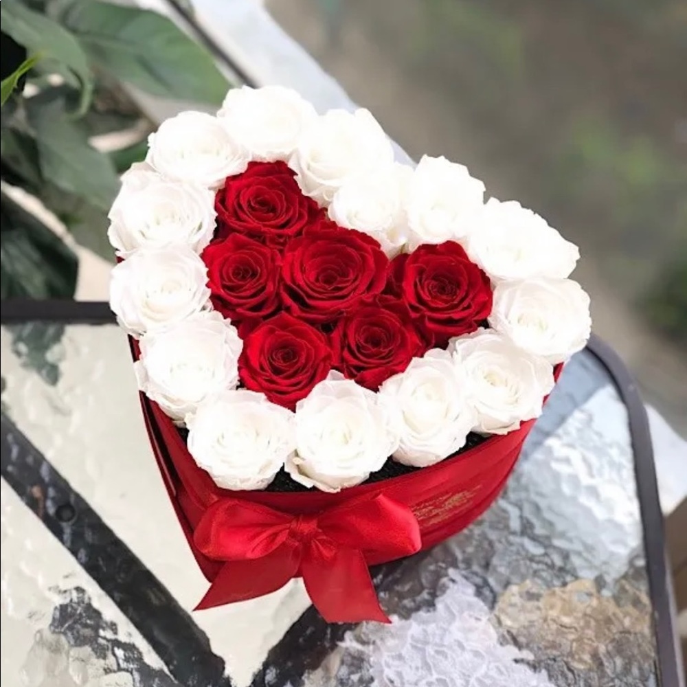 21 reserved roses in velvet heart box (10x8x6). Real roses last for years